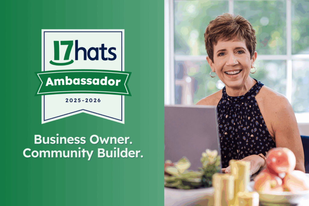 Deb Mitzel, small business expert and 17hats Ambassador, smiling at her computer, featured with the 2025–2026 Ambassador badge.